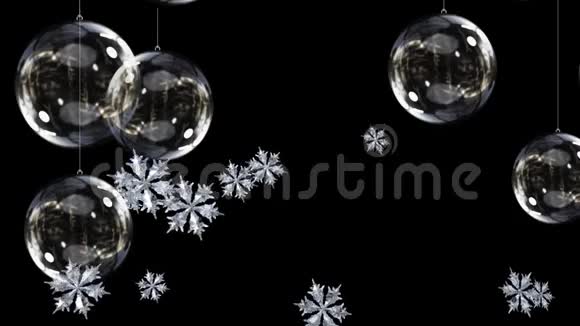 圣诞装饰品和飘落的雪花视频的预览图