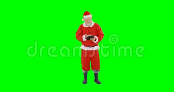 圣诞老人使用数字平板电脑视频的预览图