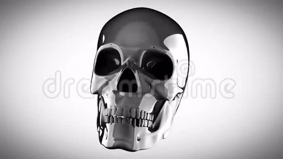 金属头骨在灰色背景上旋转视频的预览图