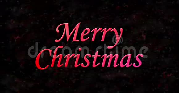 圣诞快乐的文字在黑色背景下从底部变成尘埃视频的预览图