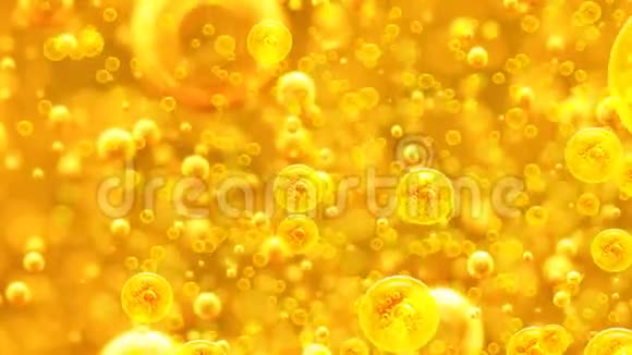 黄金背景有大大小小的金泡油里面有一种黄金液体油蜂蜜啤酒果汁视频的预览图