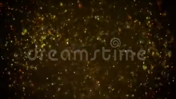 美丽的金色浮尘颗粒闪光运动背景环视频的预览图