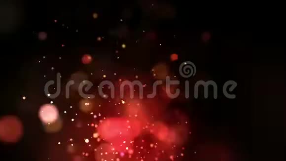在黑暗背景中漂浮着红星的粒子动画视频的预览图