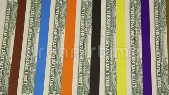 纸币和五颜六色的彩色条纹视频的预览图