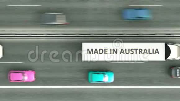拖车卡车与澳大利亚制造文本沿公路行驶与澳大利亚商业相关的可循环三维动画视频的预览图