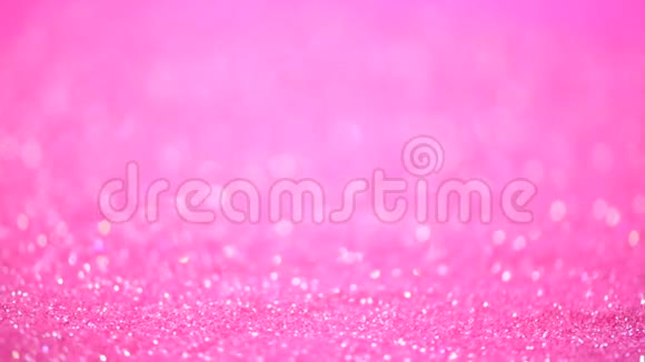 喜庆的粉红色背景抽象的闪亮灯光闪亮的假日背景视频的预览图