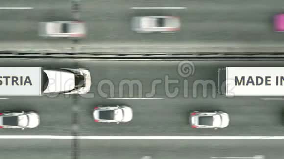 半挂车的高空俯视图在澳大利亚文字沿公路行驶委内瑞拉的业务视频的预览图