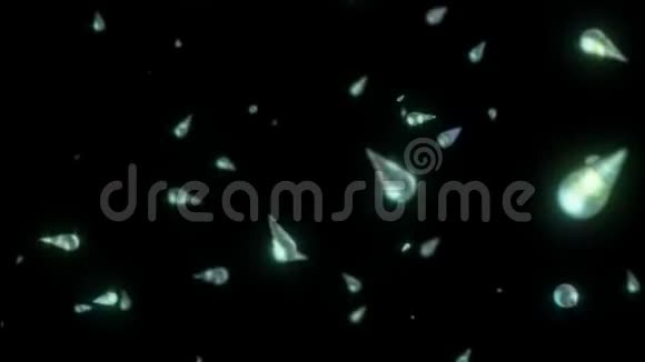 动画绿色宝石颗粒在黑色背景上视频的预览图