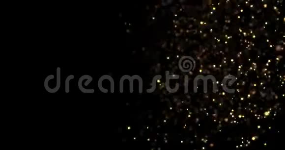 黑色背景下从一侧流动而来的圆形金光闪闪的闪光祝贺宴会视频的预览图