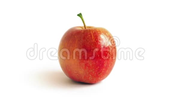 红苹果在白色背景上旋转视频的预览图