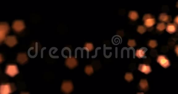 金色辉光粒子在黑色背景下的流动效应节日快乐新年活动视频的预览图