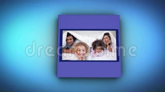 一本蓝色背景的书上的家庭录像视频的预览图