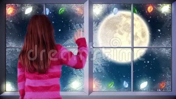 小女孩向圣诞老人挥手飞过满月视频的预览图
