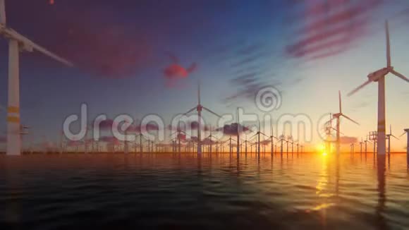 日落时配有技术人员船的海上风车平底船4K视频的预览图