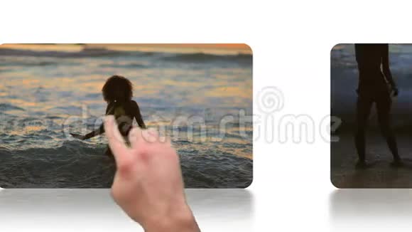 手指滚动屏幕显示海滩视频视频的预览图