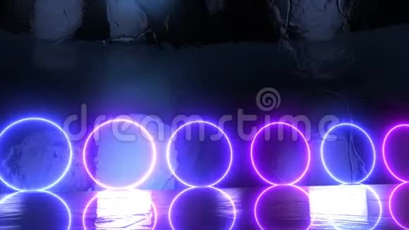 用霓虹灯圈抽象创意阶段发光LED发光发亮的球体未来和超现实的背景视频的预览图
