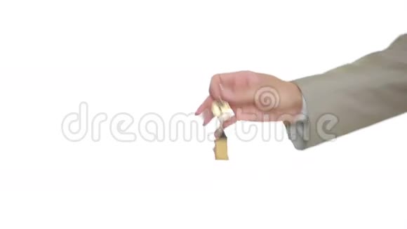 男人和女人在家里递钥匙交易用途视频的预览图