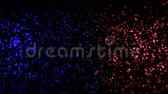 美丽的抽象多色粒子旋转和漂浮在黑暗中动画动态彩色动画视频的预览图