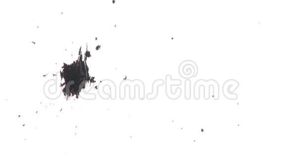多个黑色墨水点溅在纹理白色背景上视频的预览图