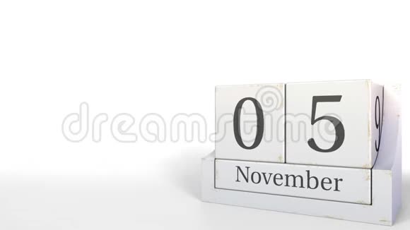 木立方体日历显示11月5日3D动画视频的预览图