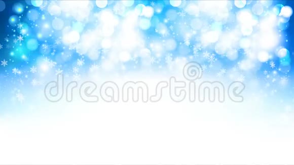冬天的蓝色背景雪花飘落视频的预览图
