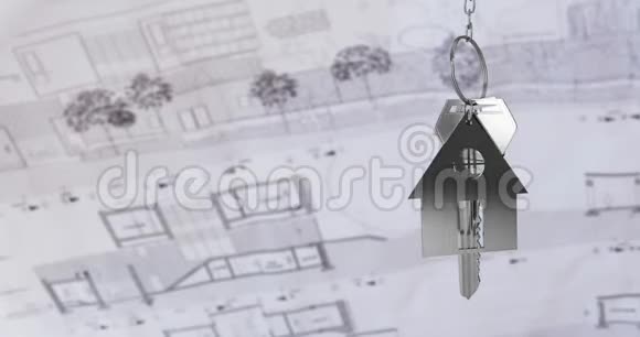 房屋钥匙和挂在建筑图上的钥匙视频的预览图