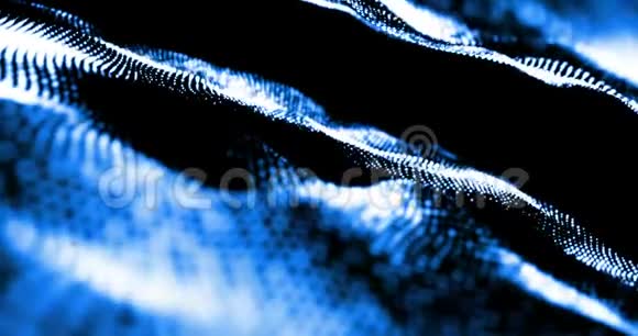 抽象圣诞蓝光发光粒子流模糊波克在黑色背景上循环节日祝贺问候视频的预览图