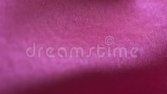 柔和优雅的淡紫色丝绸或缎质质地可作为背景软组织视频的预览图
