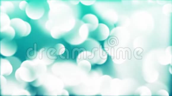 绿松石背景下发光的白波克颗粒视频的预览图
