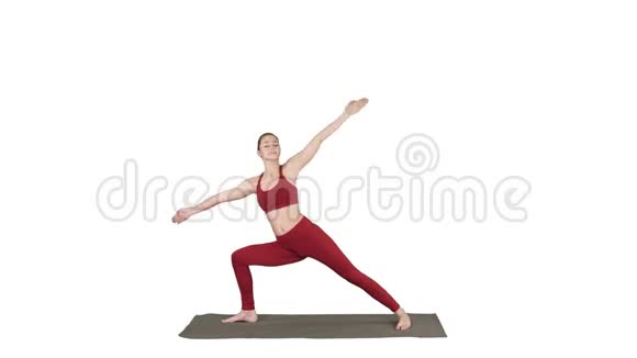 运动的年轻女子在白色背景下做瑜伽练习视频的预览图