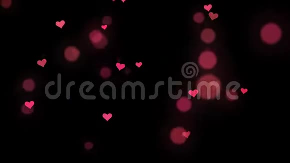 心形的粉红色纸屑飞溅的bokeh背景视频的预览图
