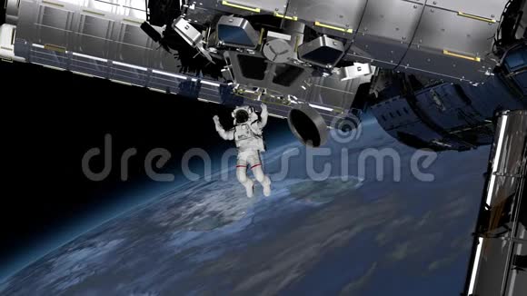 宇航员太空行走在开阔的空间里挥动他的手国际空间站国际空间站围绕地球大气层旋转要素视频的预览图
