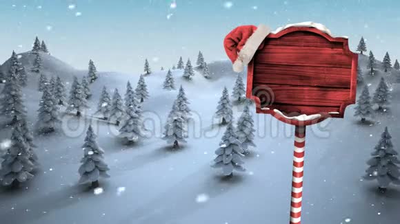 圣诞节标志和冬天的森林树木在雪地里视频的预览图