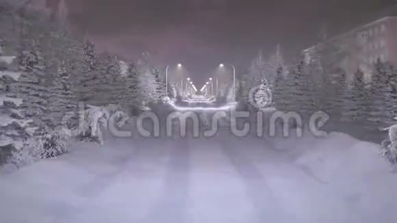 开在雪道上夜晚的城市视频的预览图