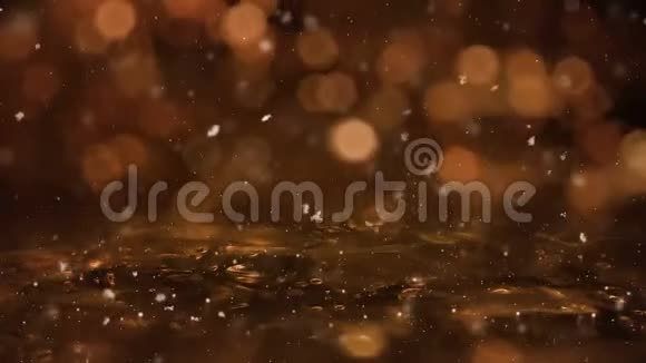 冬季金色运动背景灯雪落在冰上离焦的波克环视频的预览图