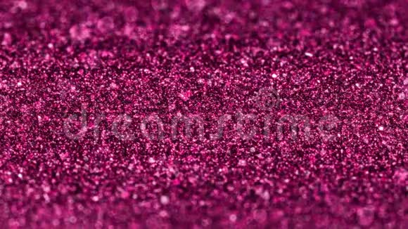 粉色微光粒子圣诞无缝环抽象背景视频的预览图
