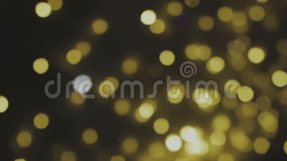 金色模糊bokeh灯光背景抽象的火花全高清循环1080p视频的预览图
