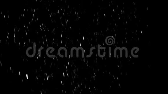 夜间积雪的微粒从顶部落下来视频的预览图