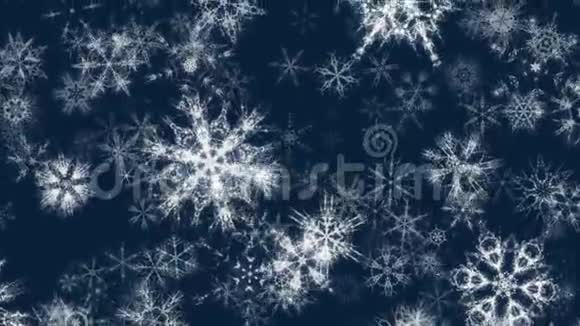 美丽的雪4k闪闪发光的圣诞雪花视频背景循环60fps视频的预览图