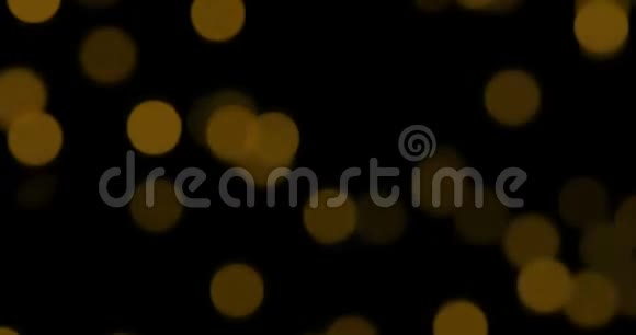 圣诞节金色渐变闪耀黑色背景的尘埃粒子金色的节日快乐视频的预览图