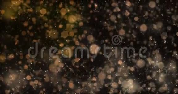 运动背景下降金色离焦的bokeh灯雪环4k视频的预览图