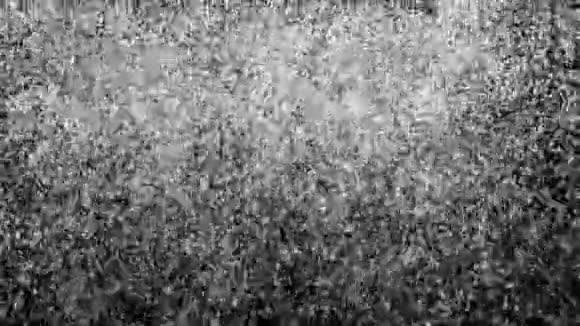 降雪背景是否孤立在黑色卢马冰上雪落的无缝环形背景第7条视频的预览图