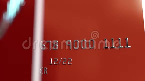 红色信用卡的特写镜头可循环动画视频的预览图