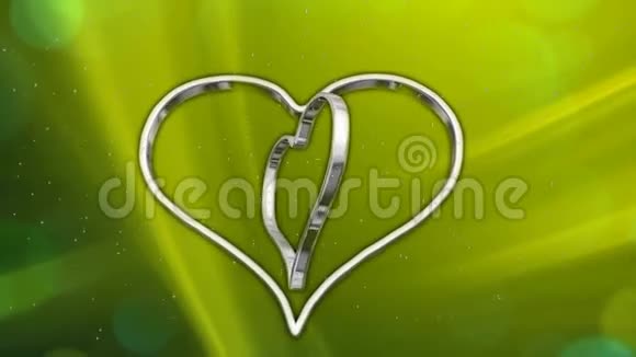 以绿色背景旋转的银色心脏为背景的运动背景视频的预览图