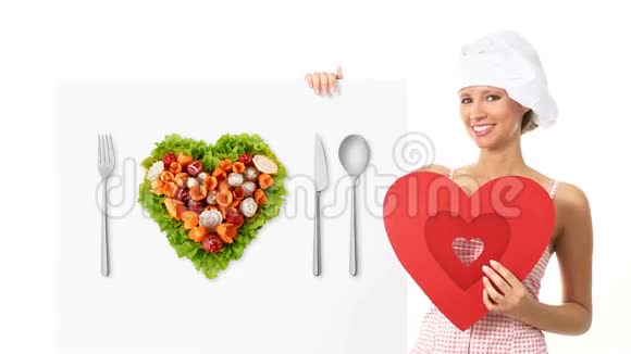 厨师女士展示广告牌心形饮食理念视频的预览图