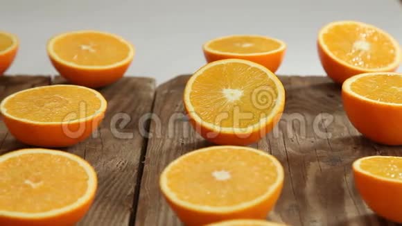 木制背景上的橘子水果视频的预览图