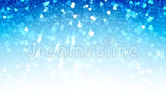 白色的心出现在蓝色闪亮的背景上情人节节日抽象循环动画视频的预览图