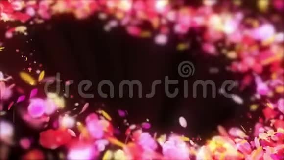 五颜六色的花瓣正在飘落春花背景循环动画很亮的花瓣视频的预览图