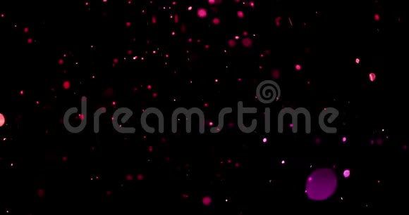 圣诞紫紫紫色渐变闪光爆炸过渡尘埃粒子从顶部黑色背景与bokeh视频的预览图