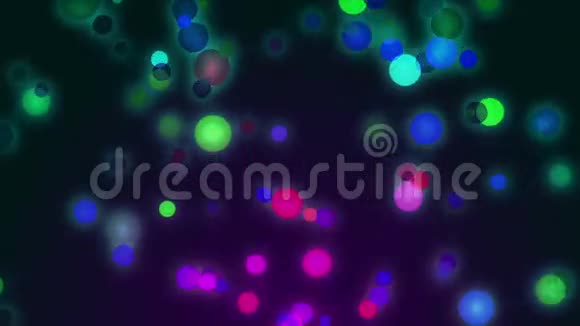 深色背景上的彩虹色粒子视频的预览图